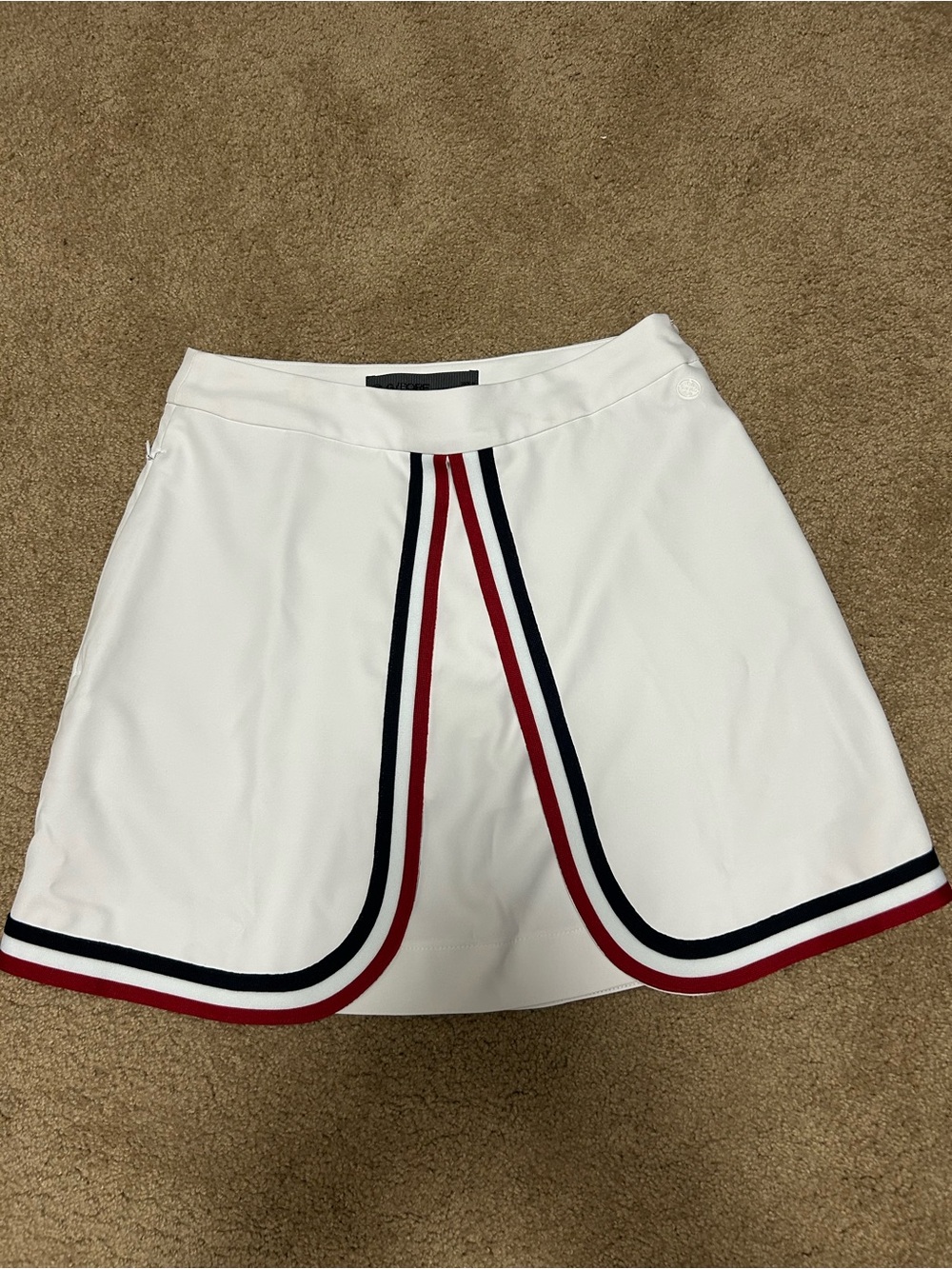 G/FORE White Golf Skort with Red and Navy Stripe Trim